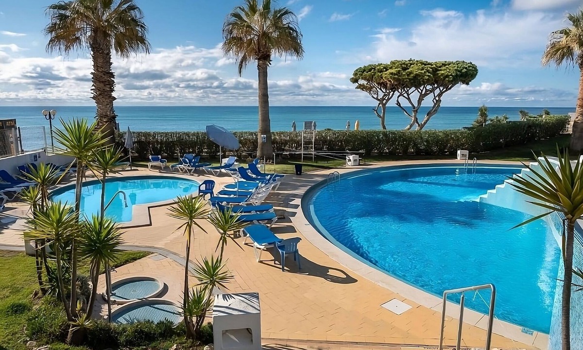Oura Hotel | Indulge in Home-Like Comfort! 2 Spacious Units, Pool or Sea View, Kitchenettes!