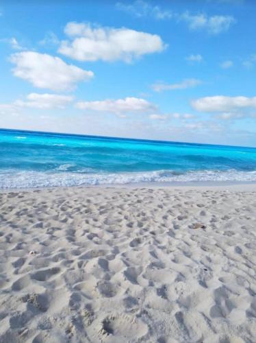 Dawwar Saqr Apartment | Marhaba Beach 2 bedroom apartment with air conditioner Egyptian only
