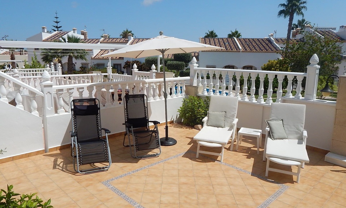 Villamartin House | Prime location for Villamatin Plaza, front terrace overlooks communal pool