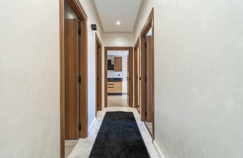 Mohammedia Apartment | Refined Comfort — Pool, Fitness Center & Kids Club