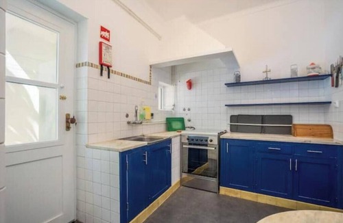 Lagos Apartment | A charming, historic apartment with a patio right on the beach