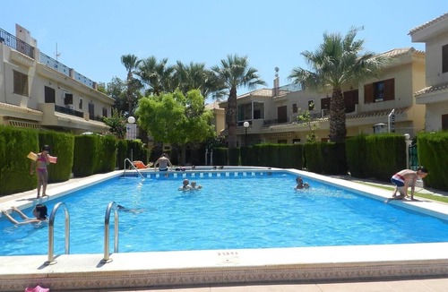 Playa Flamenca Apartment | Apartment Playa Flamenca with Pool, A/C, Terrace & Garden