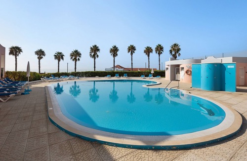 Portimao Apartment | Apartment 'Cantinho da Sara III' with Sea View, Shared Pool, Garden & A/C