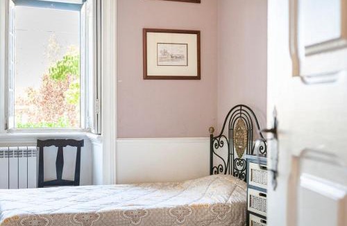 Ameal House | B&B Quarto Violeta com Chaminé