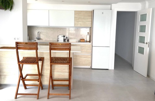 Calpe City Center Apartment | Beachfront Apartment with Sea Views, Pool, Garden & Wi-Fi