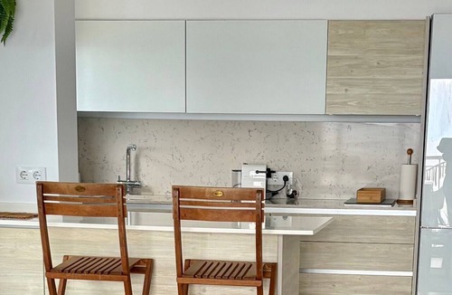 Calpe City Center Apartment | Beachfront Apartment with Sea Views, Pool, Garden & Wi-Fi