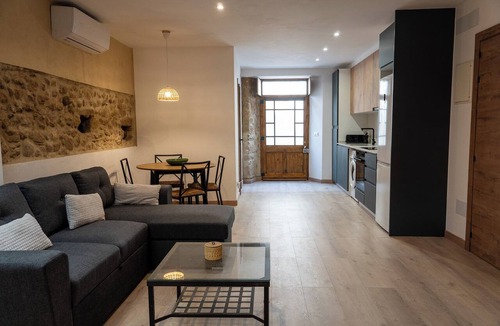 Ordis Apartment | Can Joan Loft - A romantic loft with a medieval arch on the Costa Brava