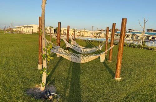 Alexandria - Mediterranean Coast House | Comfort cabin sea view & lagoon in D-bay I Beach Access Included