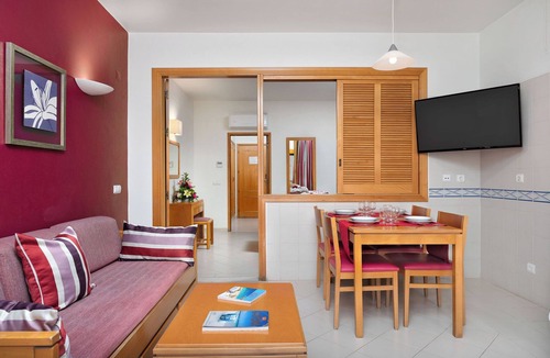 Oura Hotel | Comfortable 1BR Family Apt w/Pool Access and Water Sports Activities Nearby