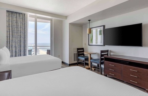 Northeast Virginia Beach Hotel | Convenience & Comfort! Unit w/Kitchenette, Partial Ocean View, Onsite Pools!