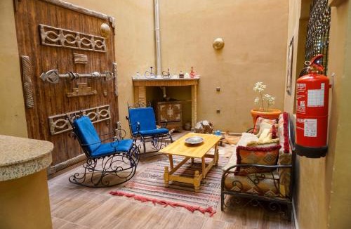 Tarmigt House | Dar bassma