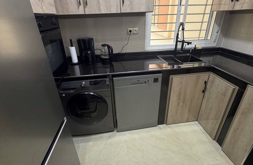Hjar Ennhal Condo | Elegant Beachfront Apartment | Pool | Terrace