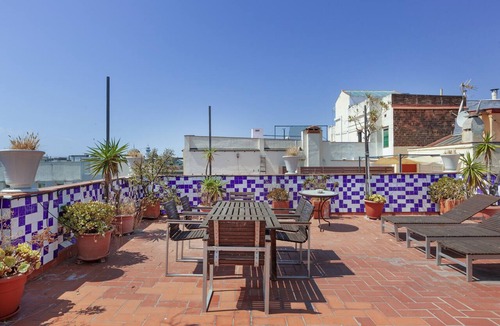 Sant Pere Apartment | Felix Apartment: Your Retreat with Terrace and Air Conditioning in the Heart of Barcelona