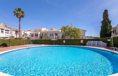 Gran Alacant House | Holiday Home 'Casa en la playa con piscinas 11 A' with Shared Pool, Wi-Fi and Air Conditioning