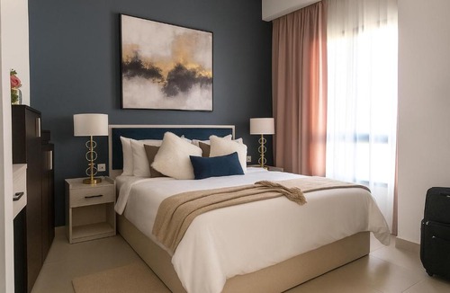 Marina El Alamein Apartment | Hotel-Style, Palm Hills New Alamein, Pool View, Lagoon & Mall Access