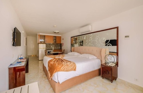 Oura Hotel | Laid-Back Sophistication with Direct Beach Access! Enjoy nearby attractions