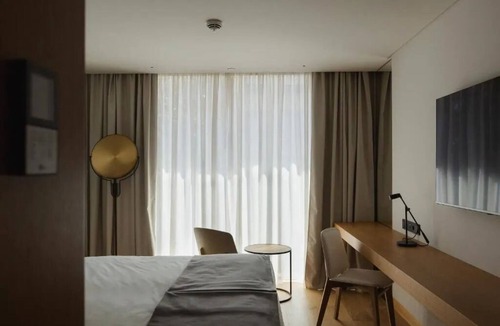 Sao Jorge de Arroios Hotel | Lisbon’s Light Show Awaits: Relax Poolside After City Wanders