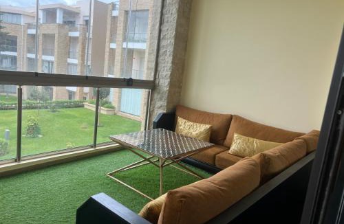 Plage des Nations Apartment | Magnifique appartement familial a Prestigia offrant une vue panoramique exceptionnelle sur trois piscines Idealement situe a seulement 5 minutes a pied de la Plage des Nations et a 20 minutes en voiture de Rabat et 15 minutes de l aeroport