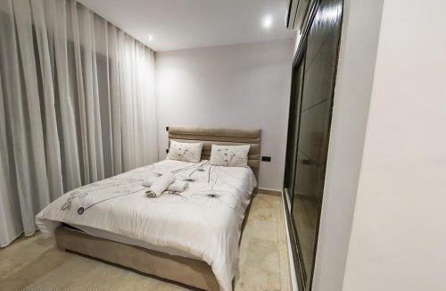 Marina Villa | Maison de luxe dans une résidence fermée avec Piscine communautaire & Free Parking,NR 63 à Marina