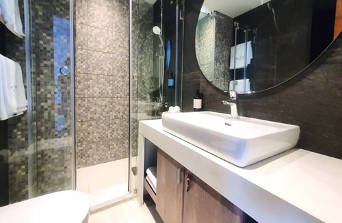 Kfardebian House | Majestic Palm: Beachfront Exotic Room in Batroun