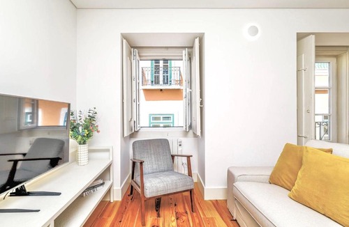 Bairro Alto Apartment | Red Tulip Flat Bright & Colourful by Homeful Homes