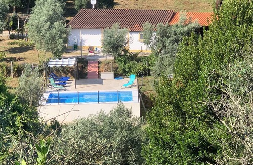 Serta House | Relax, swim and unwind at this Portuguese house 5 minutes from Sertã, Portugal.