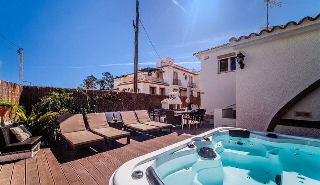 Holiday Home 'Jávea - Just Steps from the Sea' with Private Terrace, Wi-Fi & AC in Jávea