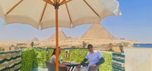Hotel pyramids show rooftop in Cairo