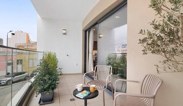 Modern Apartment in Central Faro with Parking and Balcony