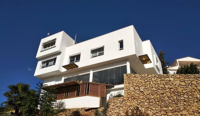 Modern house with indoor pool in urbanization with security service. in Gandia