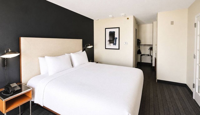 Modern King Room Perfect for Families Visiting Houston | Outdoor Pool Access in Houston