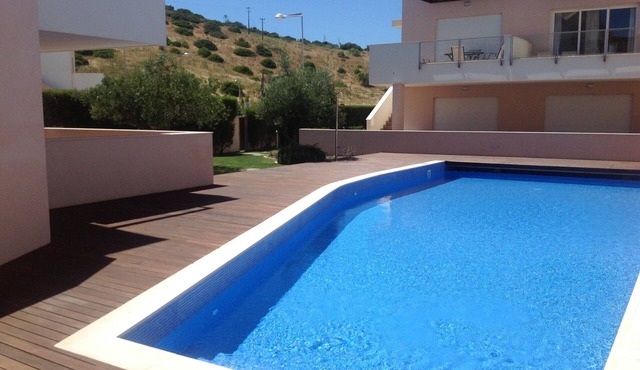 Sunny apartment with two large patio areas and views over open countryside