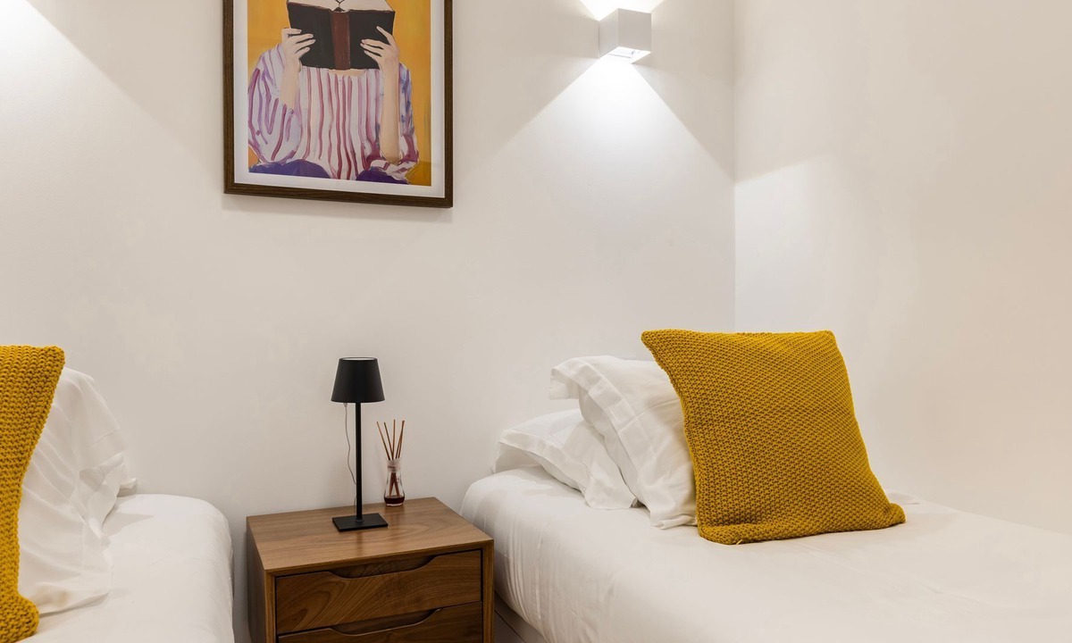 Santa Engracia Apartment | Sunny Garden 2BDR Apartment by LovelyStay
