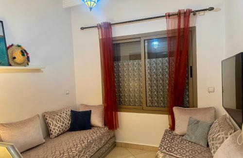 Asilah Beach Apartment | Havre de Paix avec Toit-Terrasse Vue Mer et Charme Antique
