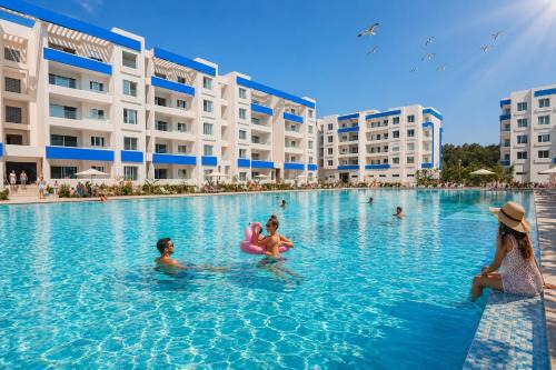 Martils most Luxury 2 bedrooms stunning Sea View Apartment Olympic Pool 1 min from beach Les Jardins Blues